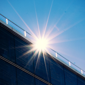 image from "Reflection glass building and sunbeams" by kfphotography